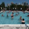 Photos: Extremely Shallow Brooklyn Bridge Park Pool Now Open For 60 "Swimmers" At A Time